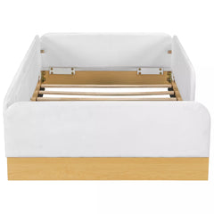 Front view of twin upholstered platform bed with white footboard and wood slats