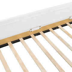Close-up of wooden mattress support slats on a twin platform bed